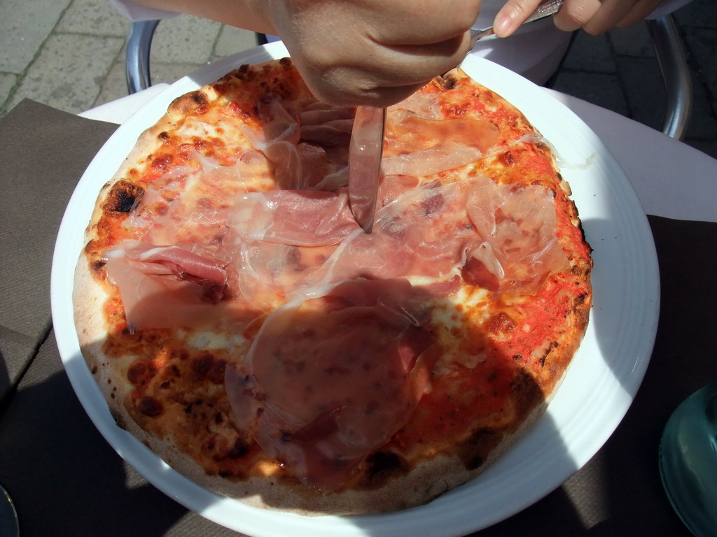Pizza at a restaurant at the Campo Santo Stefano square