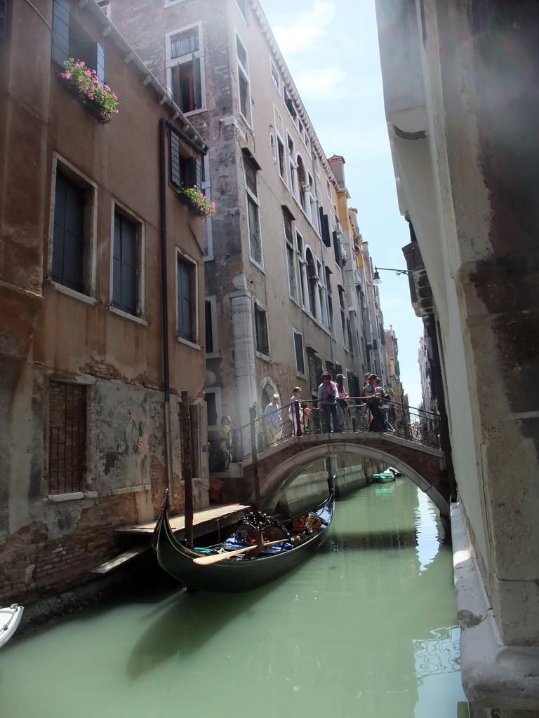 The Ponte San Maurizio bridge over the Rio del Santissimo canal, viewed from the Calle Pasqualigo Detta de l`Ogio street