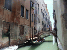 The Ponte San Maurizio bridge over the Rio del Santissimo canal, viewed from the Calle Pasqualigo Detta de l`Ogio street