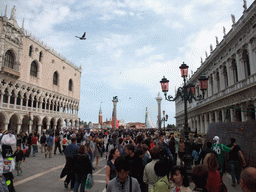 The Piazzetta San Marco square with the Palazzo Ducale palace, the Biblioteca Marciana library, the columns with the sculptures `Lion of Venice` and `Saint Theodore` on top, and the San Giorgio Maggiore island with the Basilica di San Giorgio Maggiore church