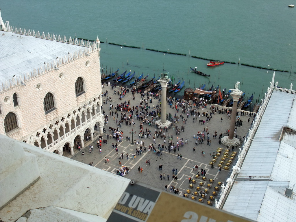 The Piazzetta San Marco square with the Palazzo Ducale palace, the Biblioteca Marciana library and the columns with the sculptures `Lion of Venice` and `Saint Theodore` on top, viewed from the Campanile Tower of the Basilica di San Marco church