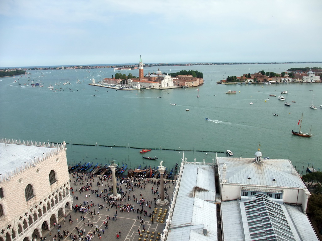 The Piazzetta San Marco square with the Palazzo Ducale palace, the Biblioteca Marciana library and the columns with the sculptures `Lion of Venice` and `Saint Theodore` on top, the Bacino di San Marco basin, the San Giorgio Maggiore island with the Basilica di San Giorgio Maggiore church and the Giudecca island, viewed from the Campanile Tower of the Basilica di San Marco church