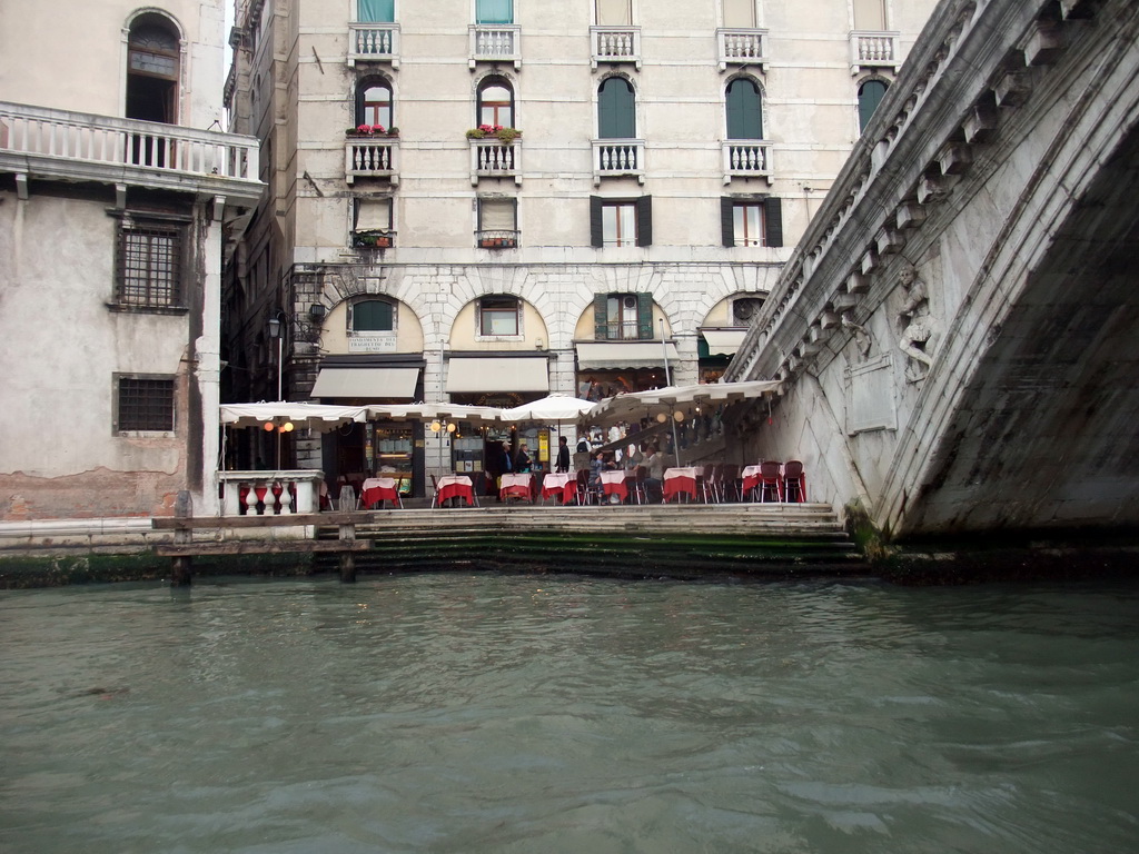 The Al Buso restaurant under the Ponte di Rialto bridge over the Canal Grande