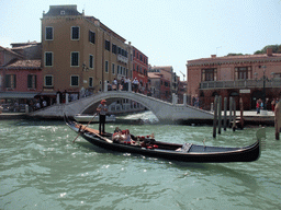 Gondola at the Canal Grande and the Fondamenta Croce bridge over the Rio dei Tolentini river