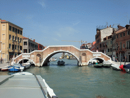 The Ponte dei Tre Archi bridge over the Canal di Cannaregio, viewed from the ferry to Murano
