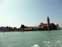 The northeast side of the Isola di San Michele island with the Chiesa di San Michele in Isola church, viewed from the ferry to Murano