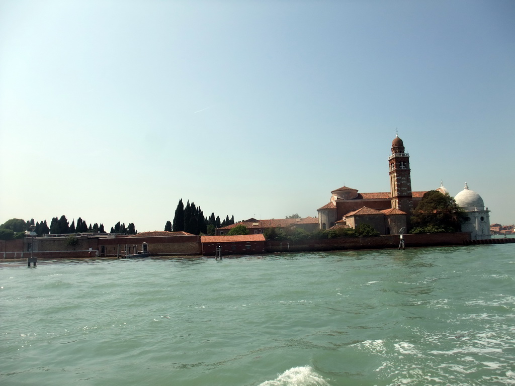 The northeast side of the Isola di San Michele island with the Chiesa di San Michele in Isola church, viewed from the ferry to Murano