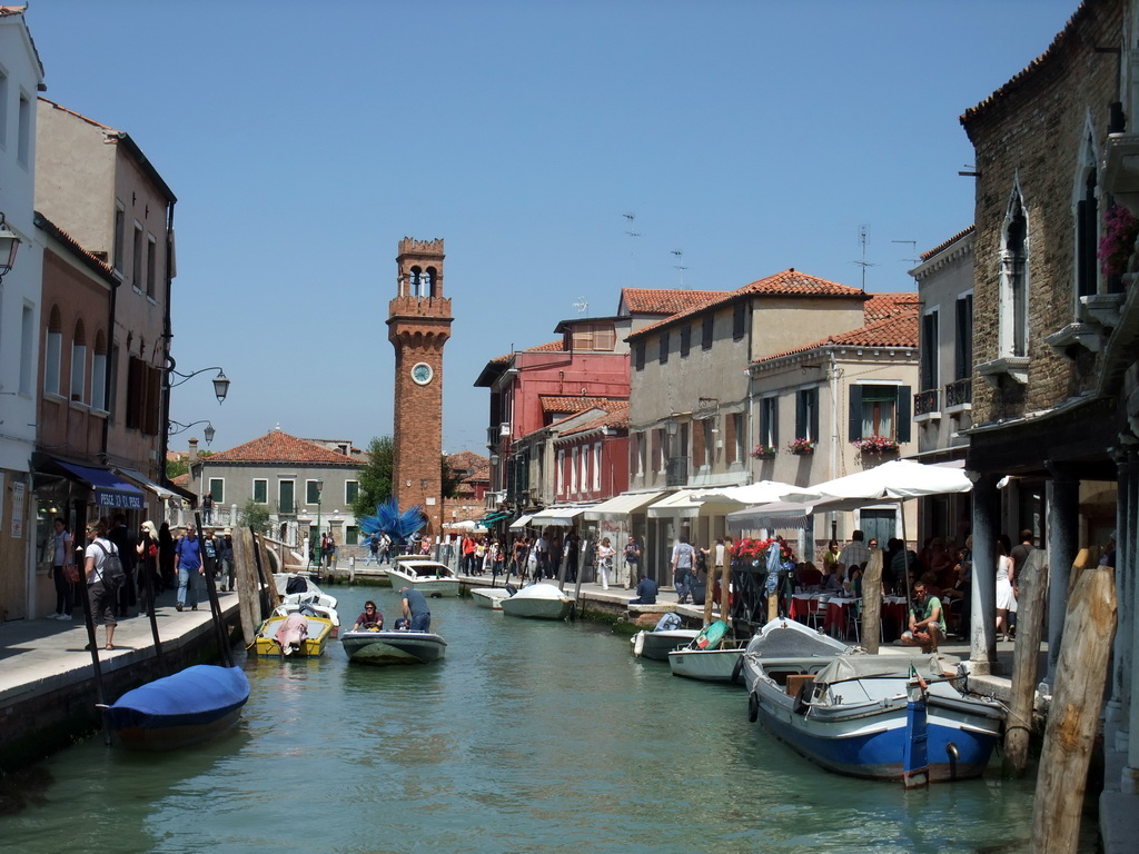 The Ponte San Pietro Martire bridge over the Rio dei Vetrai river, the Torre Merlata tower and the Campo Santo Stefano square at the Murano islands