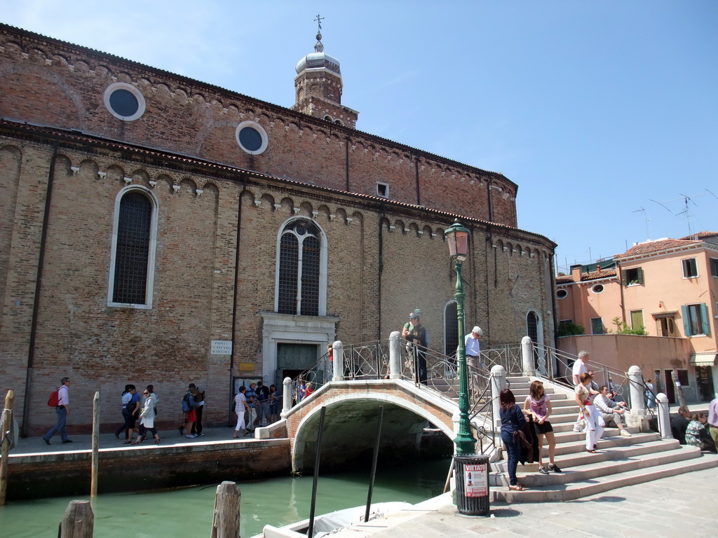 The Ponte San Pietro Martire bridge over the Rio dei Vetrai river and the east side of the Chiesa di San Pietro Martire church at the Murano islands