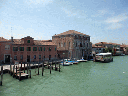 The Palazzo da Mula palace, the Mazzega Glass Factory and boats in the Canal Grande at the Murano islands, viewed from the Ponte Vivarini bridge