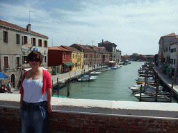 Miaomiao at the Ponte San Donato bridge at the Murano islands, with a view on the south side of the Canal di San Donato