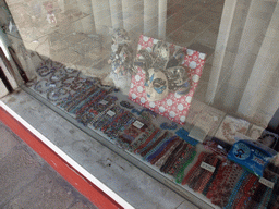 Glass items, doll and mask in the window of the shop of Mr. Simioni at the Fondamenta Andrea Navagero street