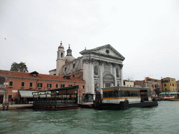 The Zattere ferry stop at the Canal della Giudecca and the Chiesa dei Gesuati church, viewed from the ferry