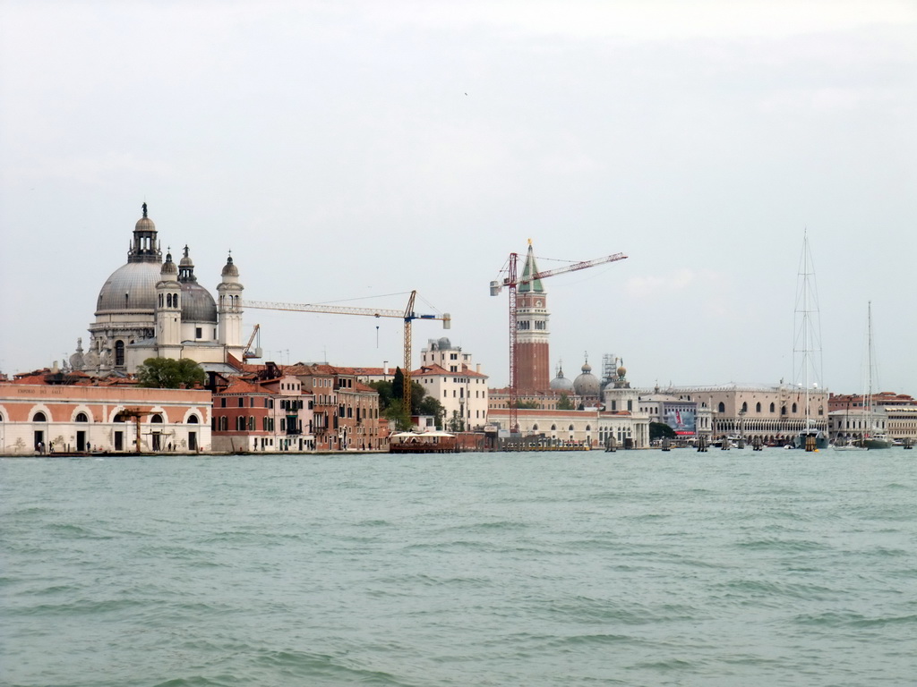 The Canal della Giudecca, the Basilica di Santa Maria della Salute church, the Bacino di San Marco basin, the Biblioteca Marciana library, the Basilica di San Marco church and its Campanile Tower and the Palazzo Ducale palace, viewed from the ferry