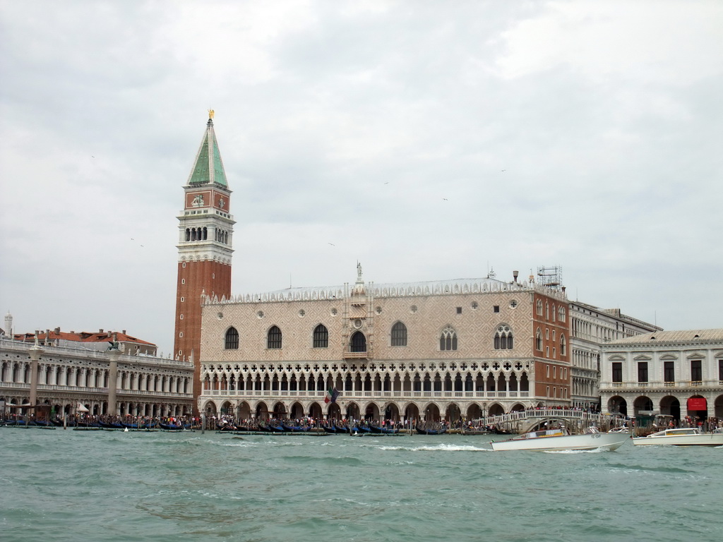 The Bacino di San Marco basin, the Biblioteca Marciana library, the Campanile Tower of the Basilica di San Marco church, the Palazzo Ducale palace and the Ponte della Paglia bridge over the Rio de Palazzo o de Canonica river, viewed from the ferry