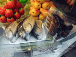 Fish, seafood and fruits in the window of a shop at the Campiello Santi Filippo e Giacomo square