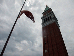 The Campanile Tower of the Basilica di San Marco church and a flag, viewed from the loggia of the Basilica di San Marco church