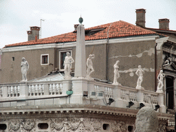 Column and statues on top of the Biblioteca Marciana library, viewed from the loggia of the Basilica di San Marco church