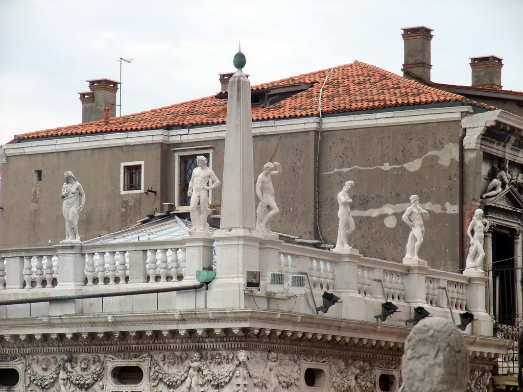 Column and statues on top of the Biblioteca Marciana library, viewed from the loggia of the Basilica di San Marco church