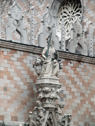 Statue above the Porta della Carta gate, viewed from the loggia of the Basilica di San Marco church