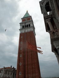 The Campanile Tower of the Basilica di San Marco church and a Venetian flag, viewed from the loggia of the Basilica di San Marco church
