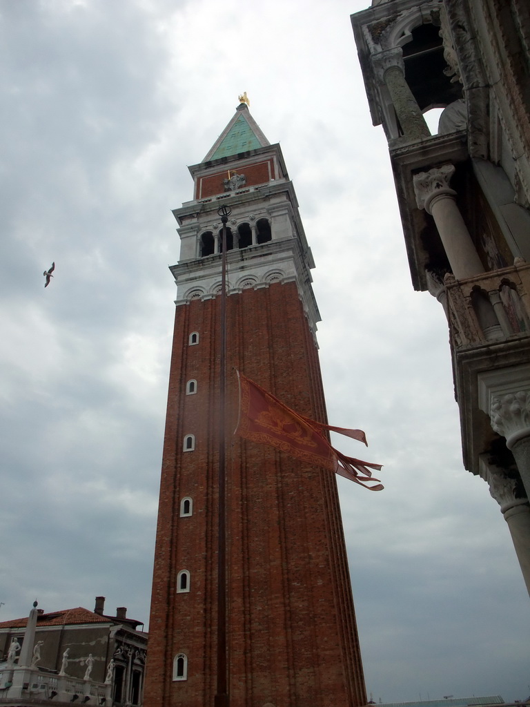 The Campanile Tower of the Basilica di San Marco church and a Venetian flag, viewed from the loggia of the Basilica di San Marco church