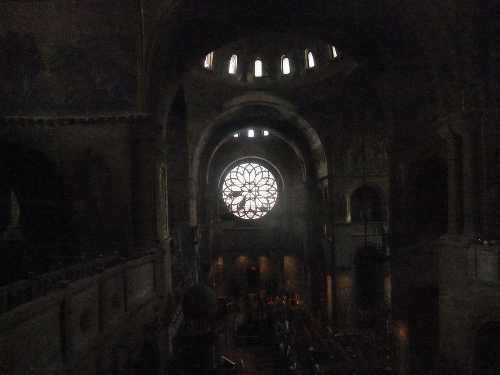 The transept, dome and right rose window of the Basilica di San Marco church, viewed from the left side of the narthex