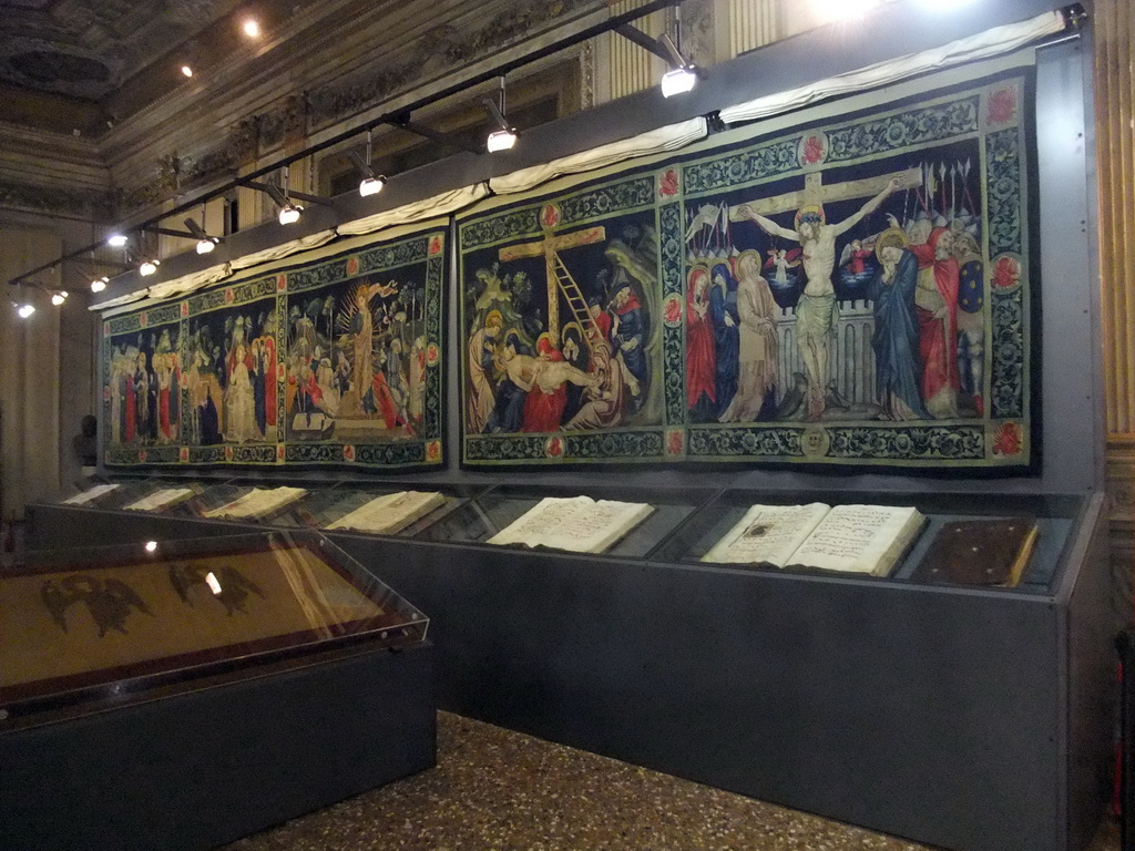 Tapestries and books at the narthex of the Basilica di San Marco church