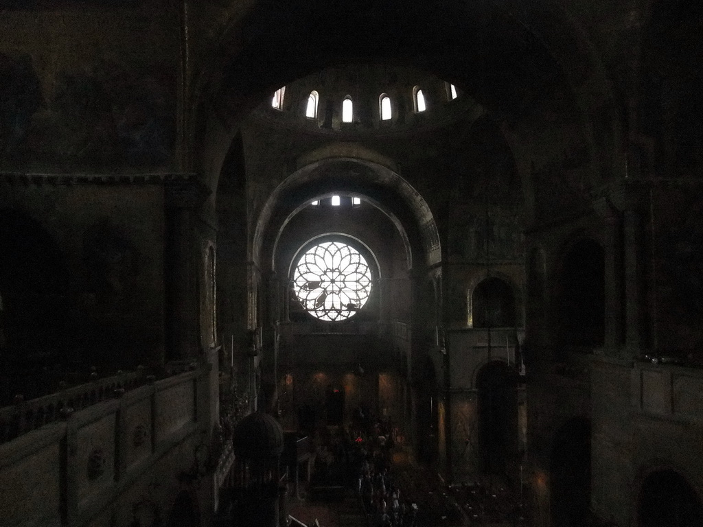 The transept, dome and right rose window of the Basilica di San Marco church, viewed from the left side of the narthex