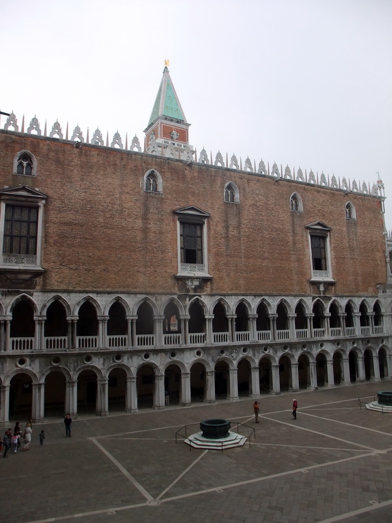 The Courtyard of the Palazzo Ducale palace with two wells and the west building