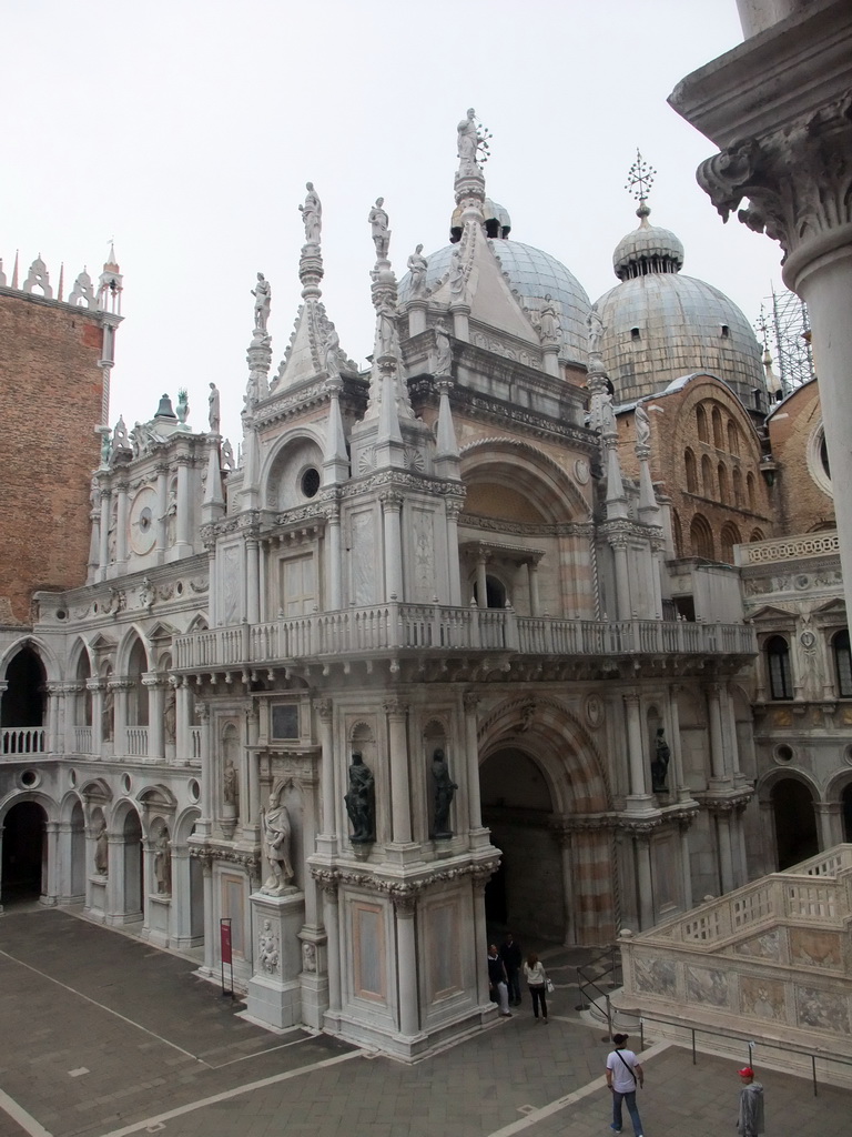 The Courtyard of the Palazzo Ducale palace with the Orologio clock, the south side of the Arco Foscari arch, the Scala dei Giganti staircase and the domes of the Basilica di San Marco church, viewed from the upper floor of the Palazzo Ducale palace