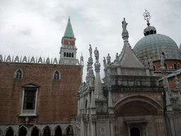 The west building of the Palazzo Ducale palace, the domes and the Campanile tower of the Basilica di San Marco church and the Arco Foscari arch, viewed from the upper floor of the Palazzo Ducale palace