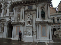 Tim with statues at the south side of the Arco Foscari arch at the Courtyard of the Palazzo Ducale palace