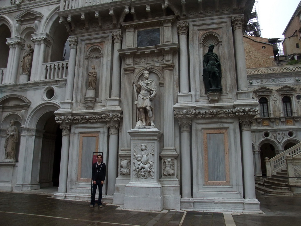 Tim with statues at the south side of the Arco Foscari arch at the Courtyard of the Palazzo Ducale palace