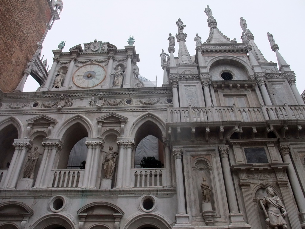 The Orologio clock and the south side of the Arco Foscari arch at the Courtyard of the Palazzo Ducale palace