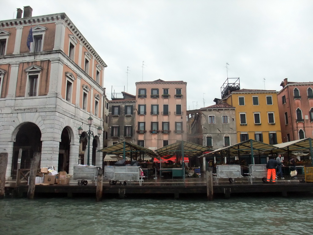 Market stalls at the Campo della Pescaria square, viewed from the Canal Grande ferry