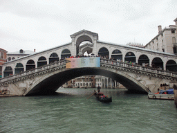 Gondola and the Ponte di Rialto bridge over the Canal Grande, viewed from the Canal Grande ferry