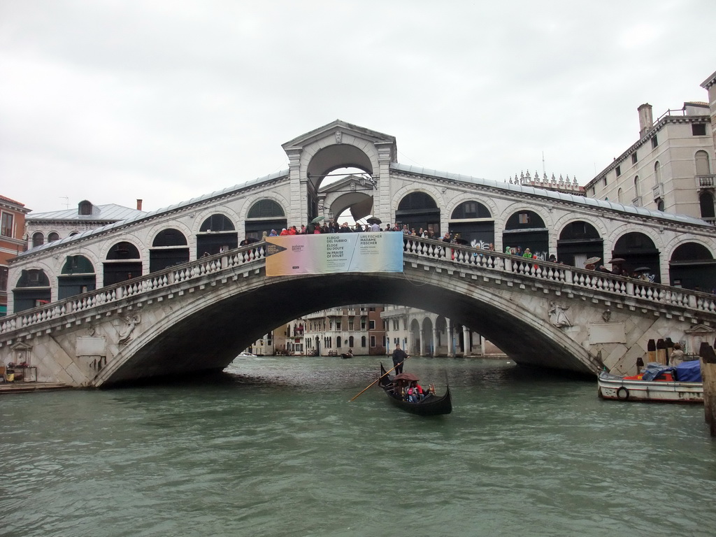 Gondola and the Ponte di Rialto bridge over the Canal Grande, viewed from the Canal Grande ferry