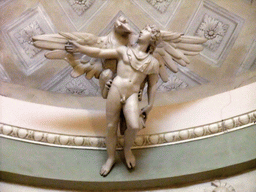 Statue of a man and an eagle at the ceiling of the Gallerie dell`Accademia museum