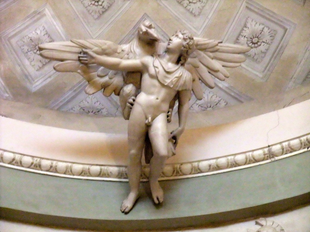 Statue of a man and an eagle at the ceiling of the Gallerie dell`Accademia museum