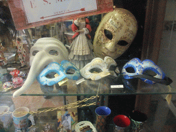 Venetian masks in the window of the Casin dei Nobili shop at the Sotoportego del Casin dei Nobile street