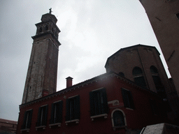 Building at the Calle Pazienza street and the Campanile tower of the Santa Maria dei Carmini church, viewed from the Ponte de la Pazienze bridge over the Rio de San Barnaba river