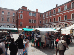 Cloth market stalls at the Campo della Pescaria square