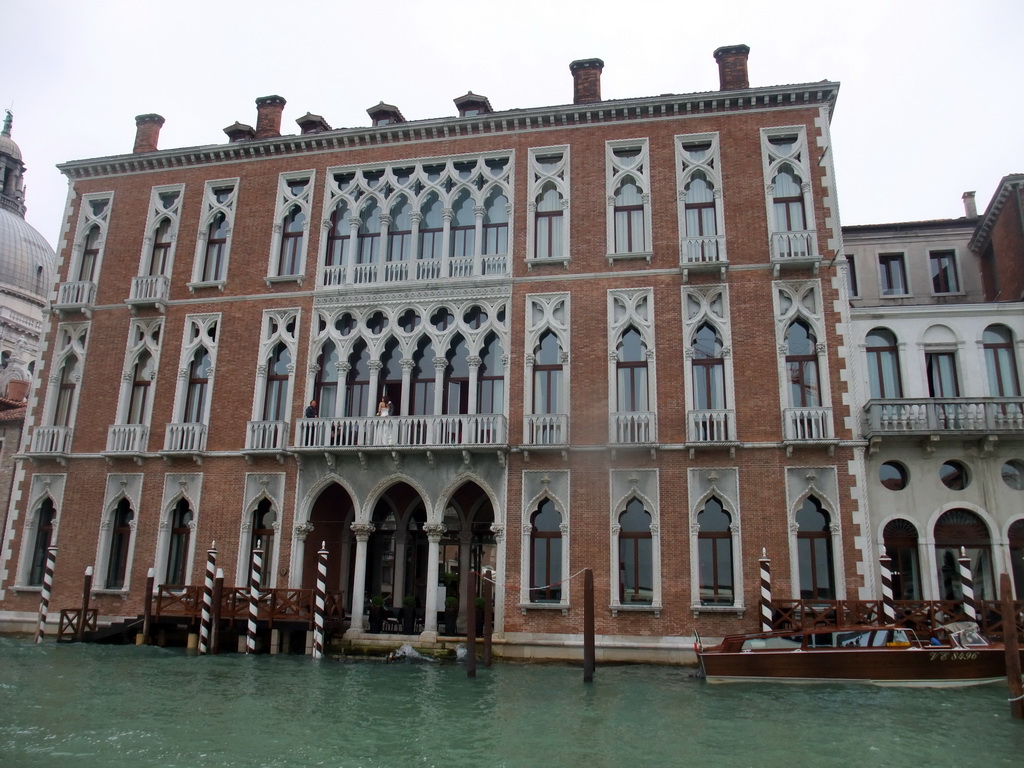 The Palazzo Genovese palace at the Canal Grande, viewed from the ferry to the Lido di Venezia island