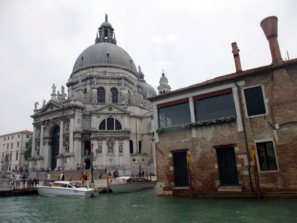 The Santa Maria della Salute church and the Ex-Abbazia San Gregorio building at the Canal Grande, viewed from the ferry to the Lido di Venezia island