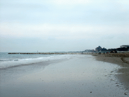 The Gulf of Venice, a pier and the public beach at the east end of the Gran Viale Santa Maria Elizabetta street at the Lido di Venezia island