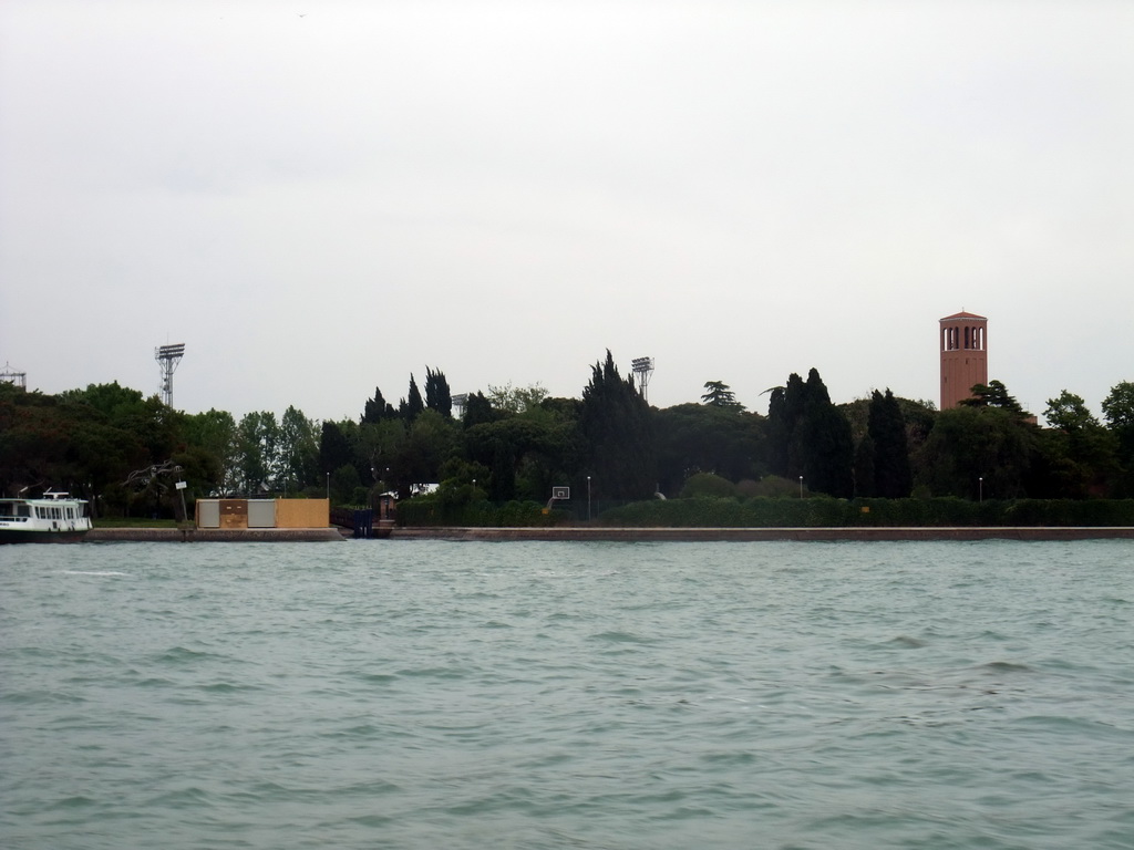 The Isola di Sant`Elena island with the Stadio Pierluigi Penzo stadium and the Campanile tower of the Chiesa di Sant`Elena church, viewed from the ferry from the Lido di Venezia island