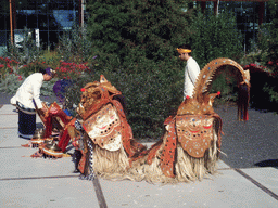 Indonesian dancers in front of the Villa Flora building at the Green Engine section