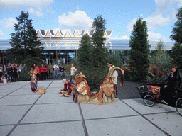 Indonesian dancers in front of the Villa Flora building at the Green Engine section