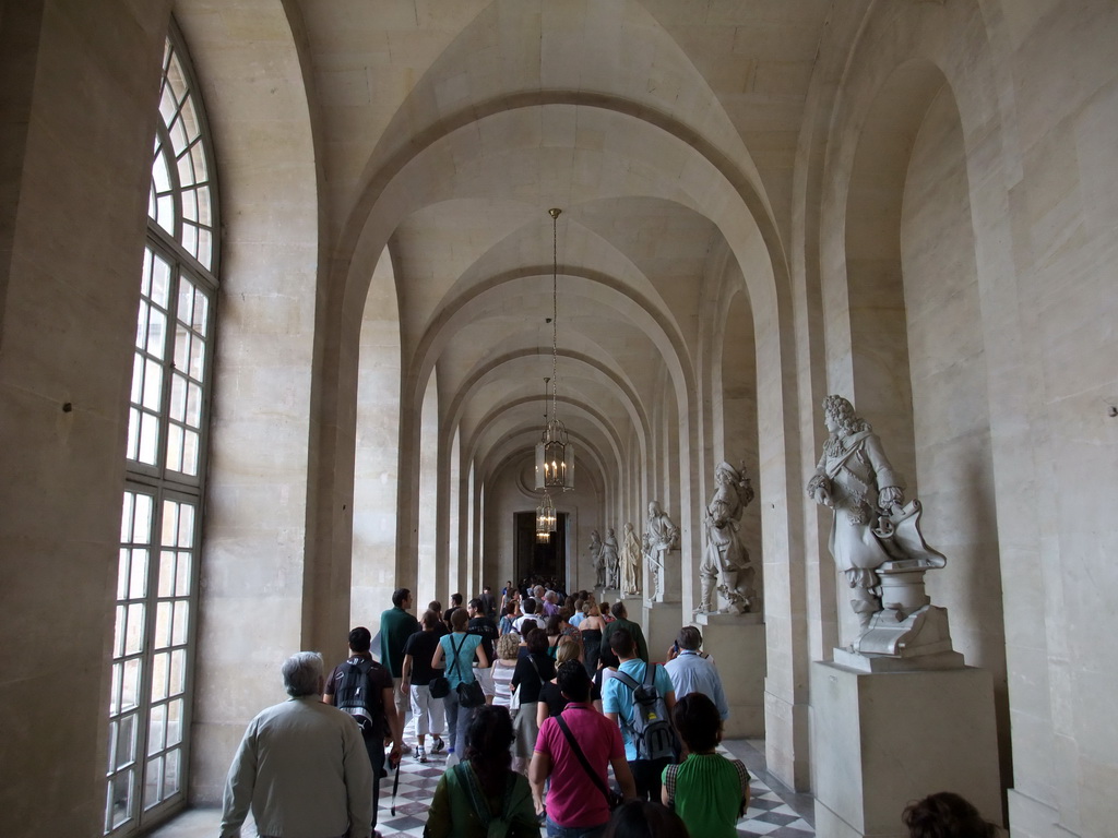 Hallway with statues in the Palace of Versailles